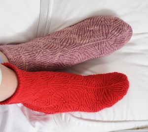 Poinsettia - This traveling stitch design is basically concentric diamonds with a slight modification that changes them into leaves.